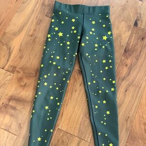 Brand new Ultracor green with yellow stars leggings, S.
